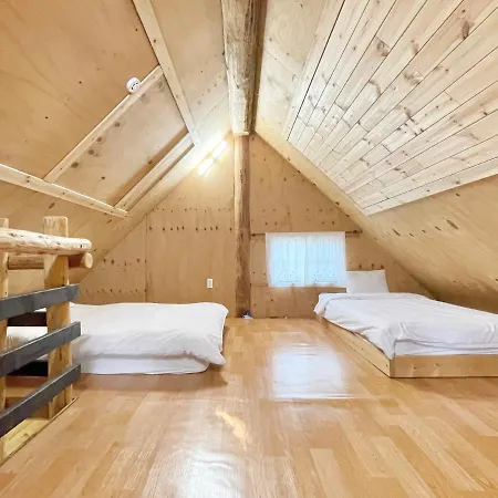 Log Park Dochidol Ranch Villa Jeju Exterior photo